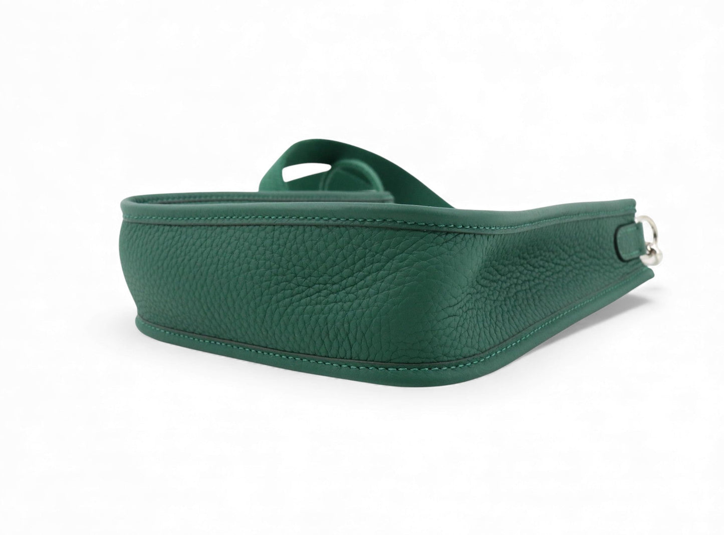 Green leather belt on a white background