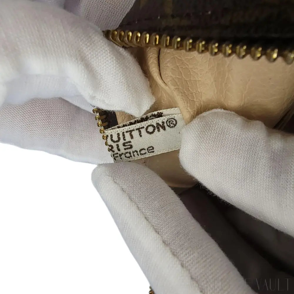 Monogram Trousse Toilette 23